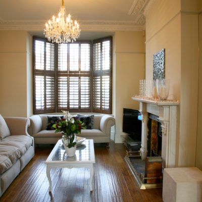 Tier On Tier Wood Stained shutters